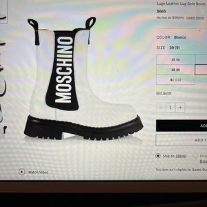 Moschino logo leather lug sole boots